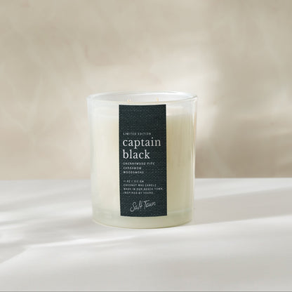 Candle labeled &