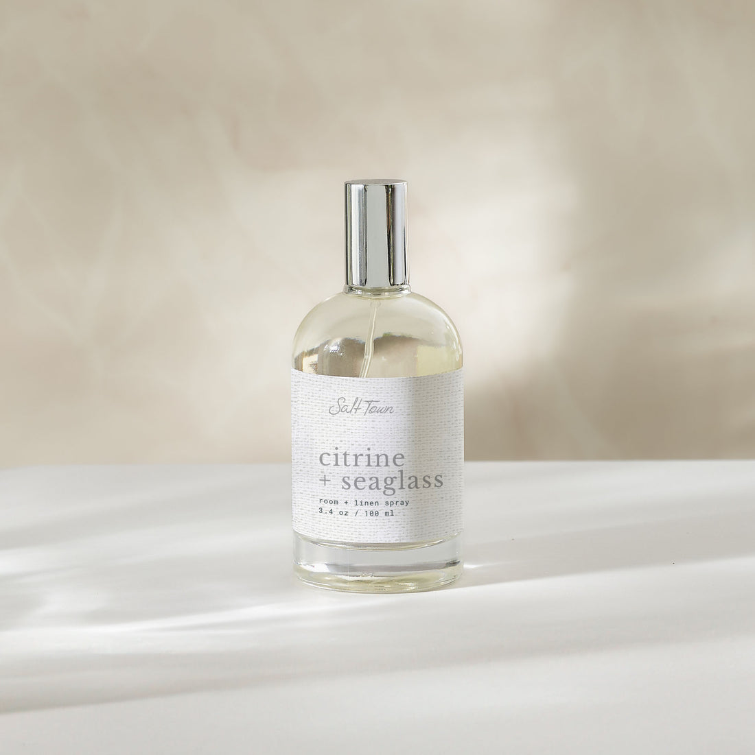 Room and linen spray bottle labeled &