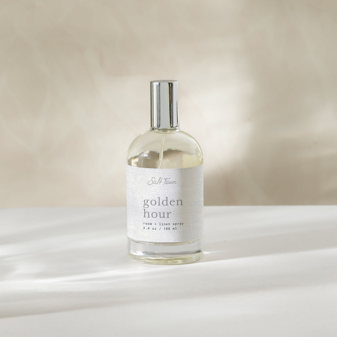 Room and linen spray bottle labeled &